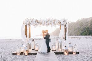Romantic Wedding on the Sand With White Flower Arch