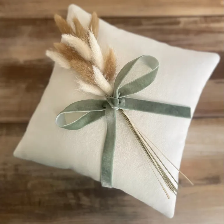 White velvet ring bearer pillow with sage green velvet ribbon