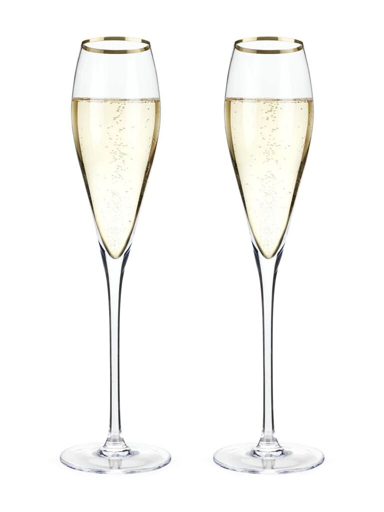 Gold-rimmed wedding champagne flutes