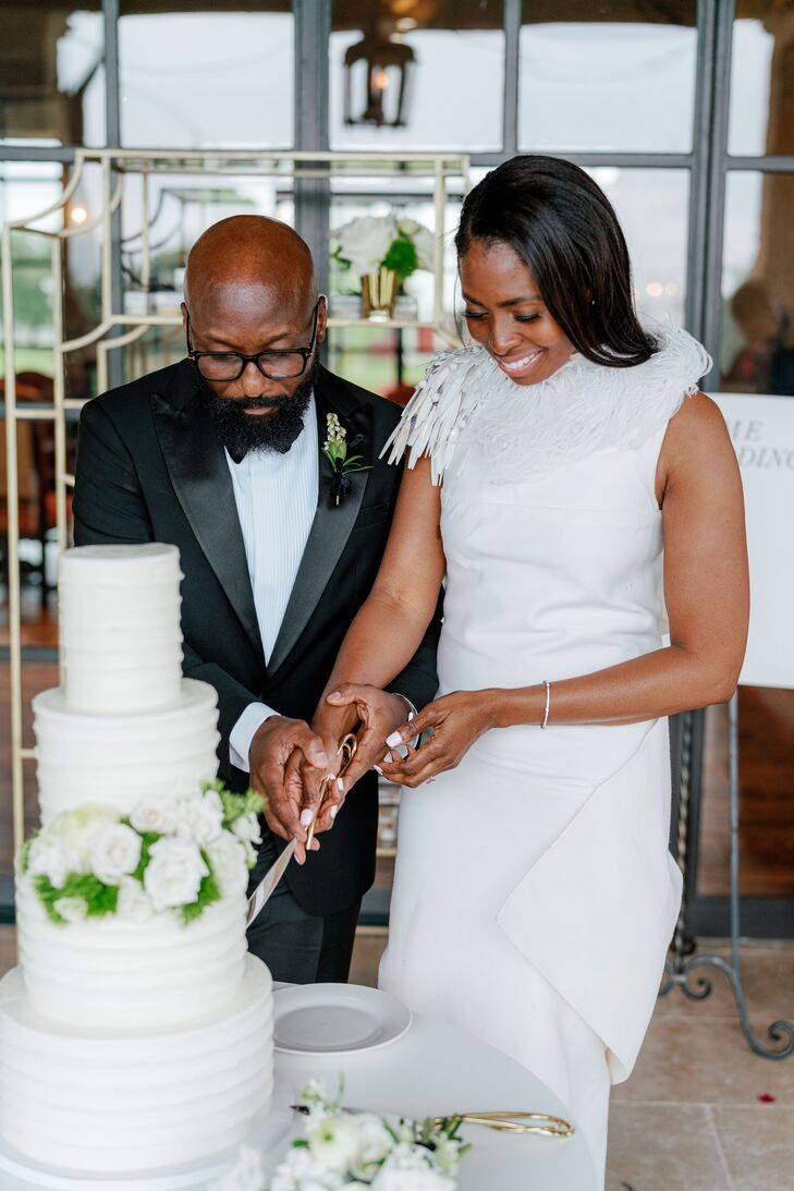 Couple Cutting Wedding Cake at The Club at Houston Oaks in Texas