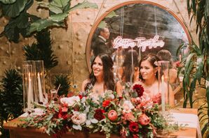 Rustic Sweetheart Table with Red Flower Arrangements