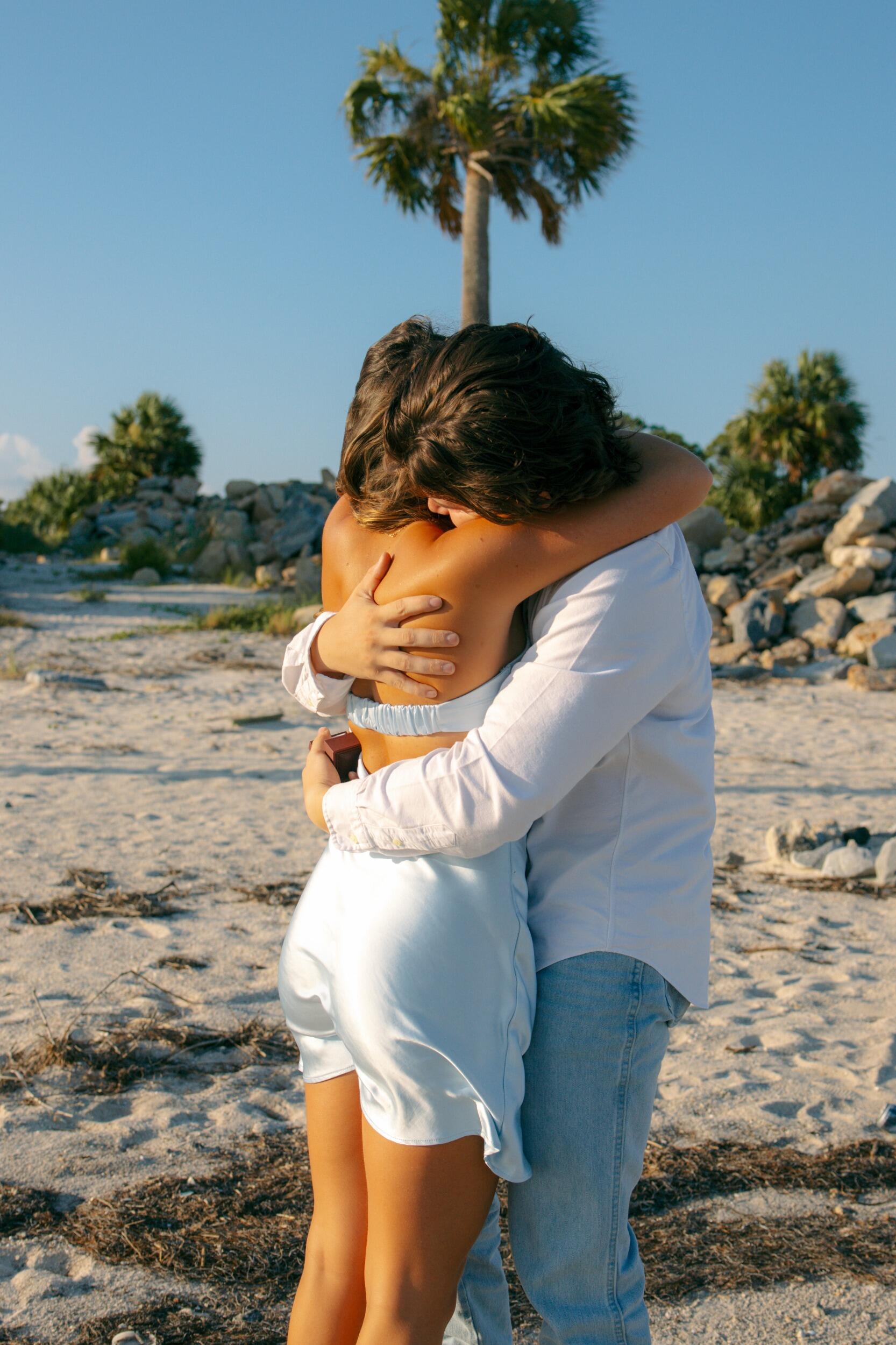 Caleb completely suprised me by proposing during a photoshoot we had scheduled for months. I had no idea.
