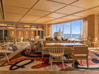 Dining room space with large windows overlooking downtown Seattle
