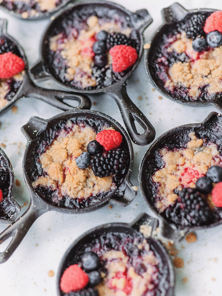 Berry cobblers in cast iron pans for a rustic winter wedding. 