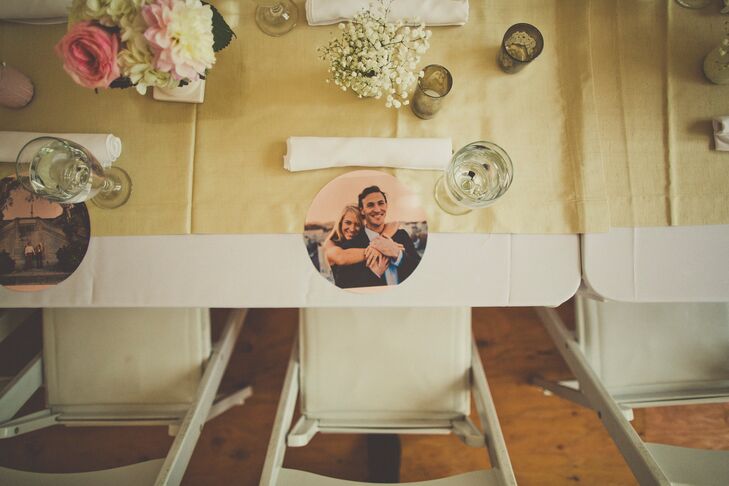 Instead of traditional chargers, the couple printed their engagement photos onto round place mats for each place setting.
