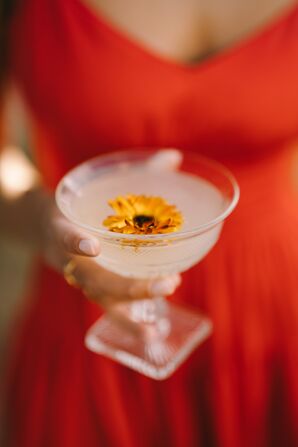Signature Cocktail Garnished With Edible Flower