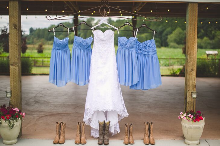 Justine chose a sweetheart-neckline wedding dress with a lace overlay, and her bridesmaids donned short, strapless, cornflower-blue dresses. Justine and her girls all wore brown cowboy boots to add a country flair.