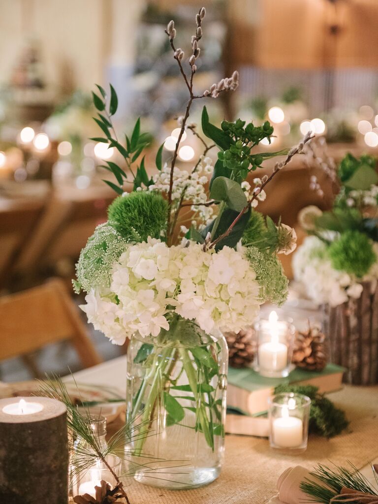 low greenery centerpiece with dianthus, white hydrangea and pussy willow branches