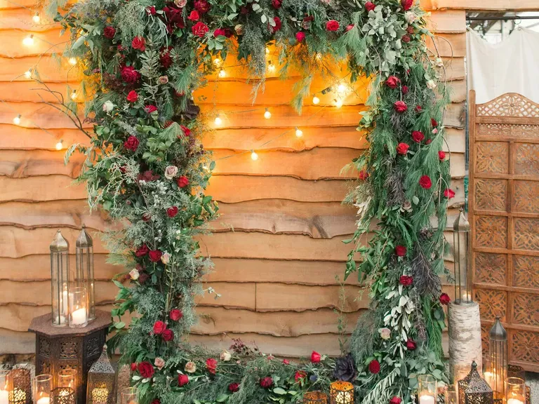 Christmas Wedding Ceremony Arch With Red Roses