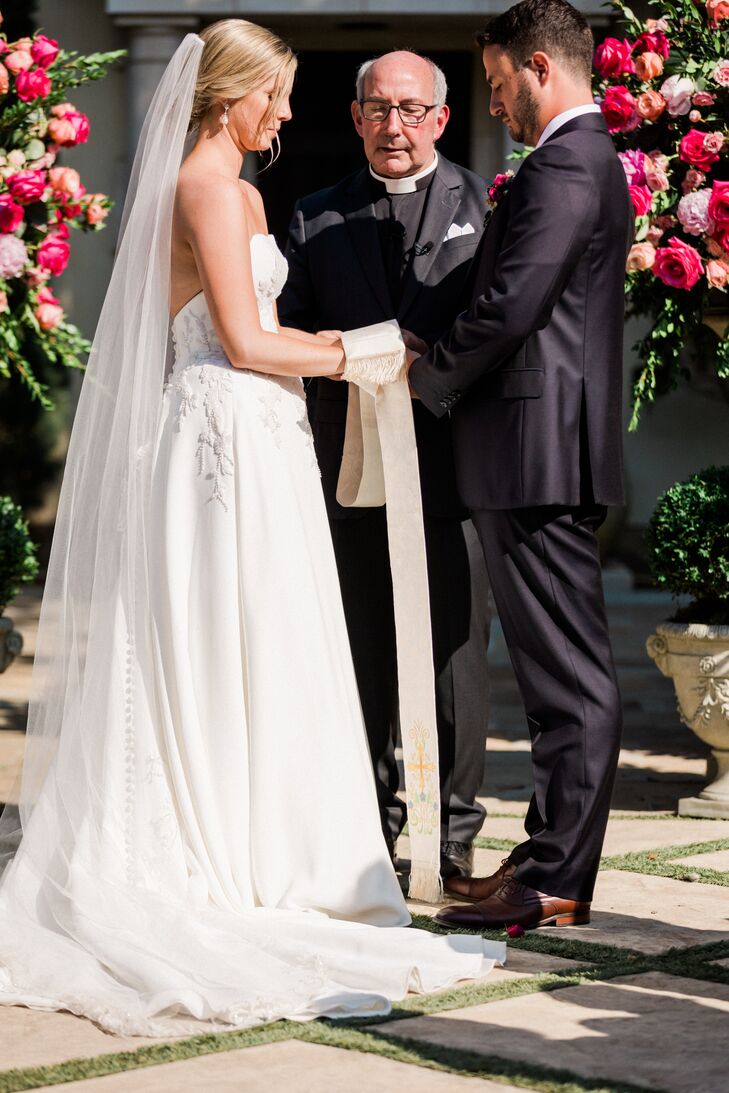 Elegant Couple Participates in Hand Fasting Ceremony at Wedding, Tradition, Episcopalian Minister