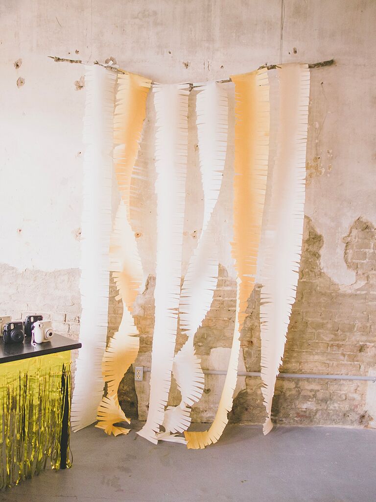 DIY crepe streamer wedding reception backdrop