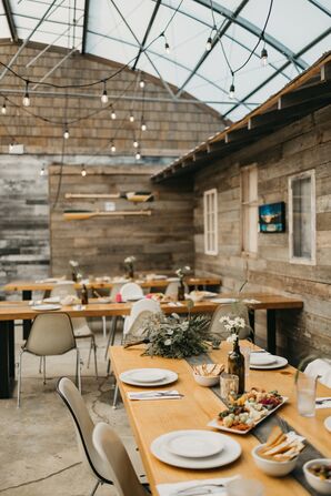 Simple, Minimalist Wedding Reception with String Lights and DIY Centerpieces