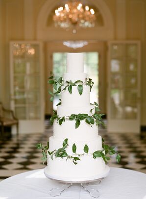 Sophisticated Buttercream Cake with Greenery and Decorative Linear Piping