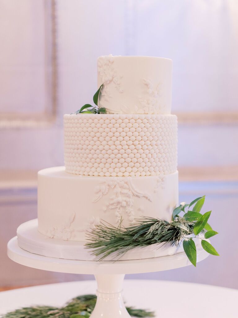 Modern white three-tier staircase wedding cake