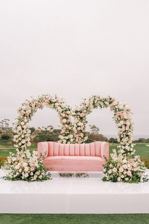 Rose Arch and Blush Velvet Sofa at Wedding Lounge Area