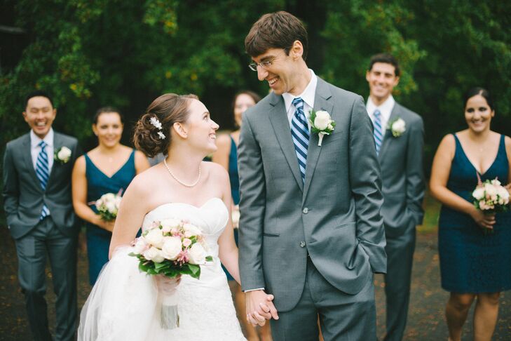 The groomsmen wore light grey suits, white shirts and navy blue striped ties.  "We rented the suits from The Black Tux which was very affordable and they looked fantastic," says Emily.
