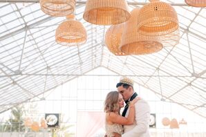 Couple Sharing First Dance Under Woven Chandeliers