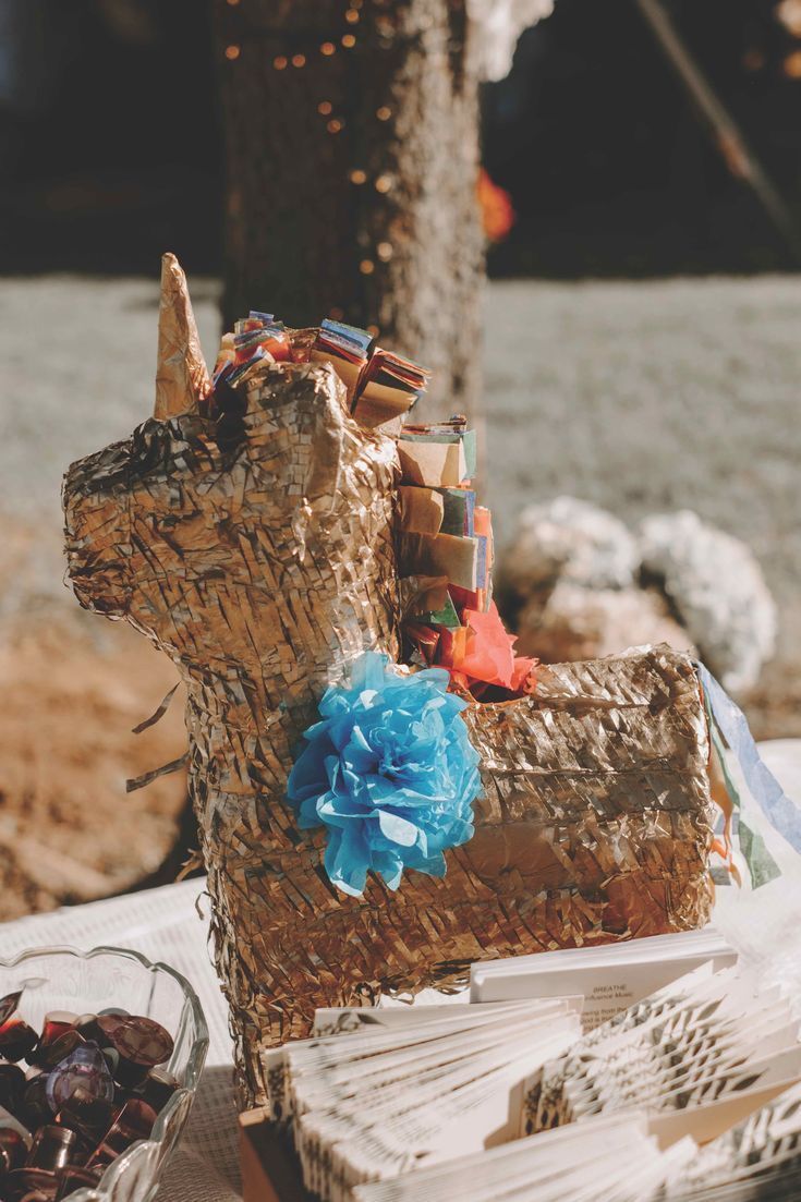 gold piñata guest book