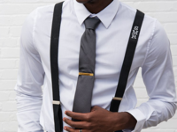 Black tuxedo suspenders with white monogram