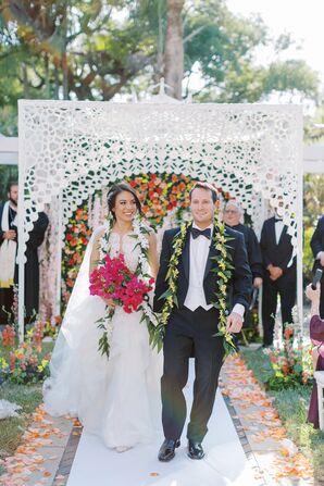 Bride and Groom Wearing Hawaiian Leis Recessing From White Laser-Cut Chuppah