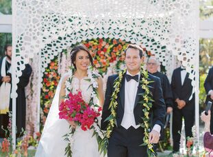 Rachel and Eric's wedding at The Vinoy Renaissance in St. Petersburg, Florida, was bold and beautiful. The couple selected a vibrant emerald-and-coral