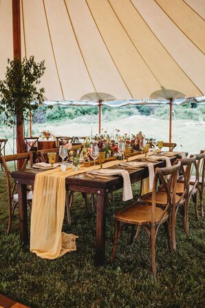 Tented Wedding Reception With Farm Table and Table Runner