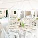 Tented Reception With Gray and White Floral Linens