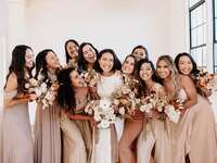 Bridesmaid group photo with bride on wedding day