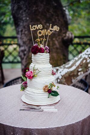 Four-Tier Cake with Flowers and Cake Topper