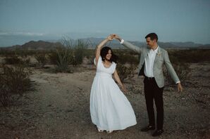 Casual Desert Couple with Bohemian Wedding Dress and Gray Suit Jacket