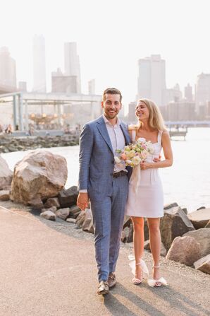 Modern Couple Wearing Gray Suit and Short Dress in New York City
