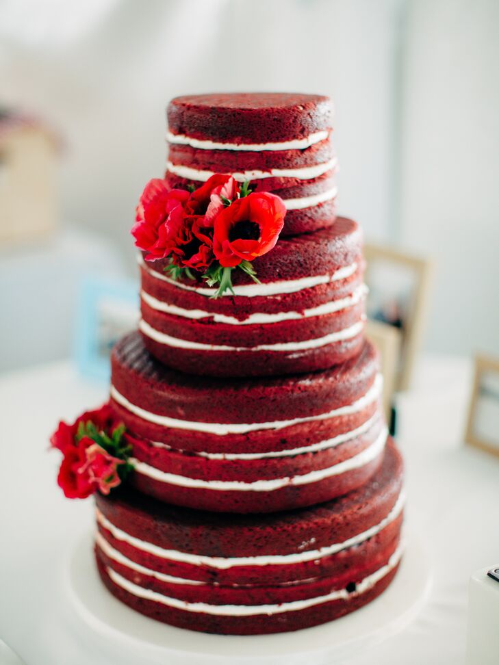 The perfect accent to a bold stripe wedding theme? A red velvet naked cake. Between rich layers of cake, white buttercream frosting and red flowers gave the cake a statement-making look.