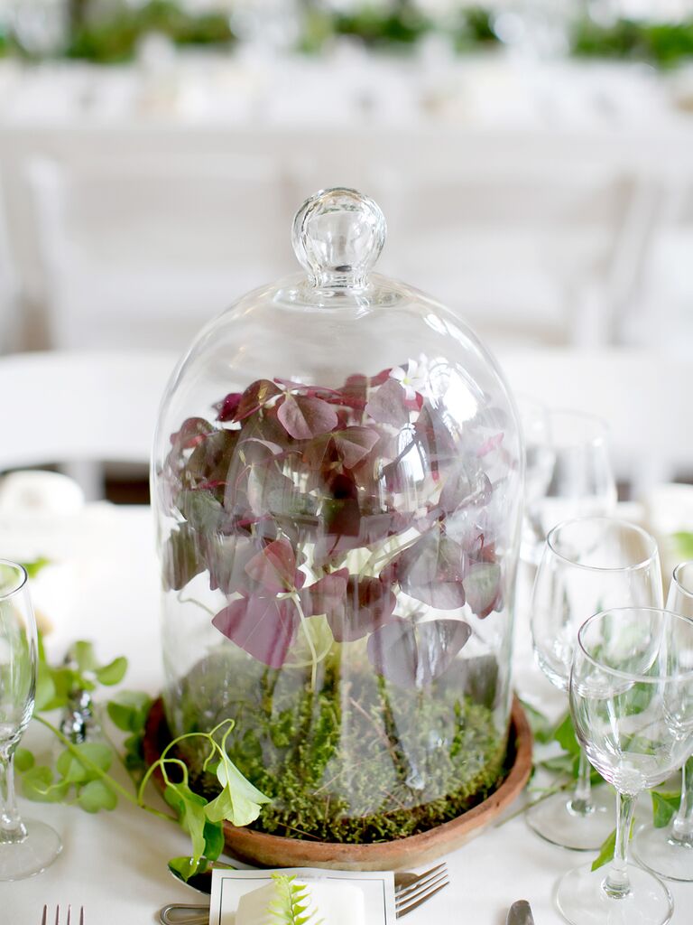unique fall wedding centerpiece with moss and burgundy leaves in glass bell jar