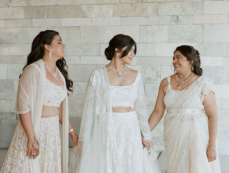 Bride with maid of honor and matron of honor