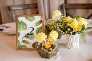 Table Number with Fig Leaf Illustration Alongside Geometric Centerpieces