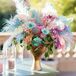 Bright Tie-Dye Flower Arrangement at Retro Grateful Dead-Inspired Reception