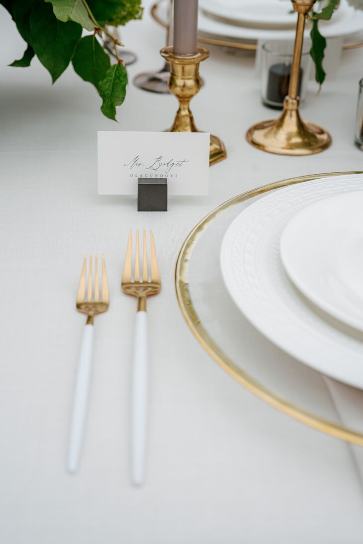 White-and-Gold Flatware and Gold-Rimmed Glass Charger