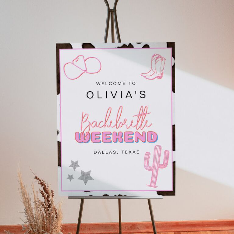Cow-print custom bachelorette sign. 