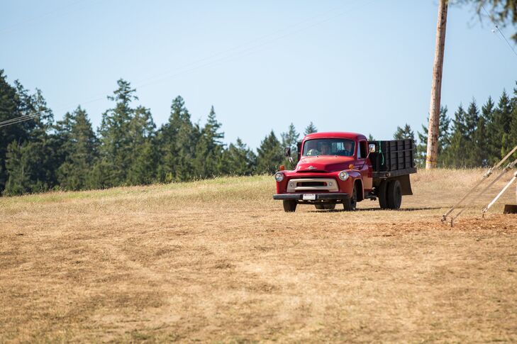 In true country style, Allyson arrived to the ceremony in the passenger seat of an antique truck in a bright shade of cherry red that belonged to Tyler's uncle.