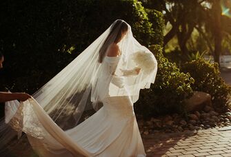 Bride wearing long veil