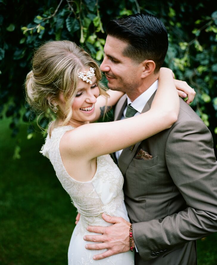 Gina fell in love with a vintage-style headpiece. The grand crystal details stood out along her forehead as the rest of her headband tucked into the loose updo. The accent captured their bohemian style with a chic touch. (The owner of True Beauty Marks, Gina also did her soft pink makeup herself.)