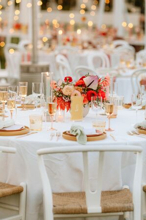 Round Table With Retro Table Number and Low, Bright Centerpiece