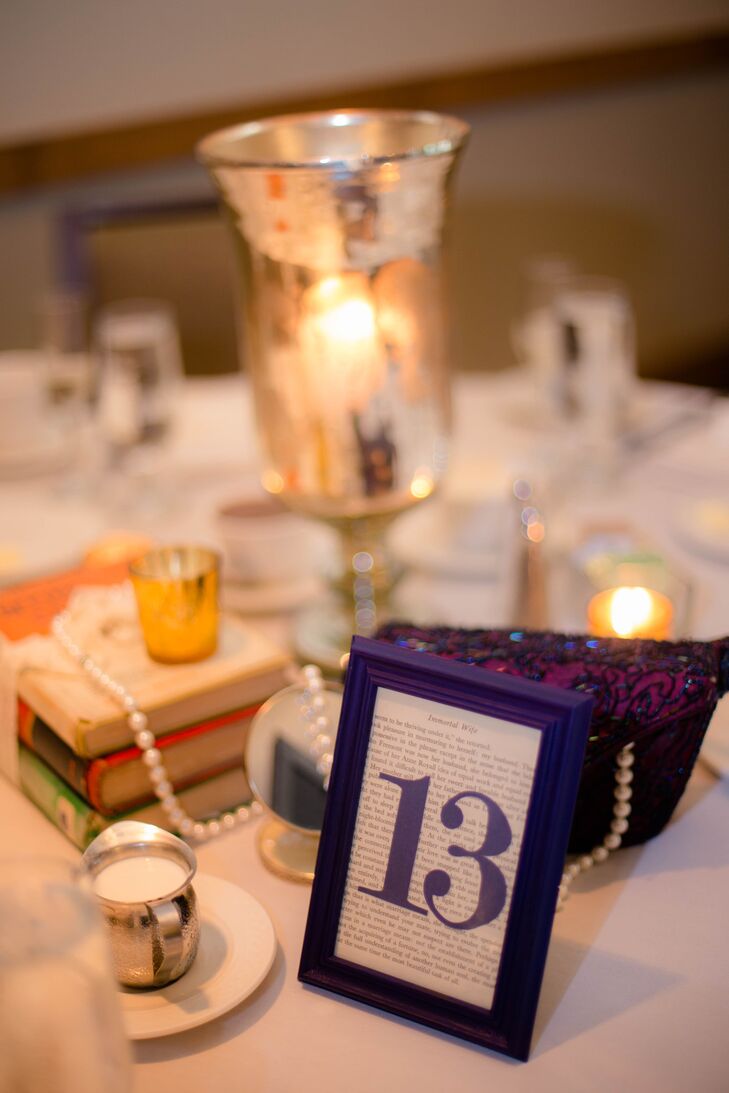 While Emily and her bridesmaids were getting ready, the team at the Details Matter took care of all the centerpieces. Every vintage book, dinnerware and accent that Emily and her mother had tirelessly gathered over the months of their engagement were spread across the tables, bringing out that vintage vibe. DIY navy book page-inspired table numbers in bold frames tied everything together.