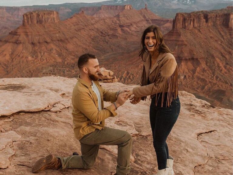 Couple getting engaged at the Grand Canyon