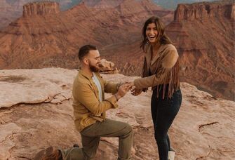 Couple getting engaged at the Grand Canyon