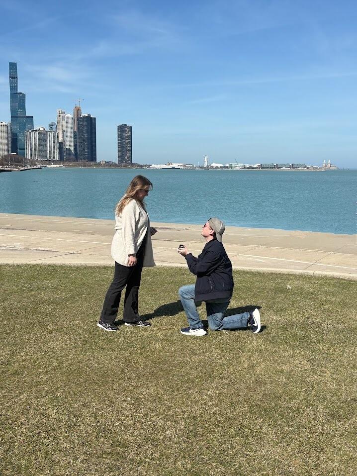 After hijacking a weekend for Jaina and her friends, Rob pulls everyone to the Field Museum on a bright, sunny Saturday with the ring box in his pocket. After walking around the museum and museum campus, he proposed to Jaina by the lake.