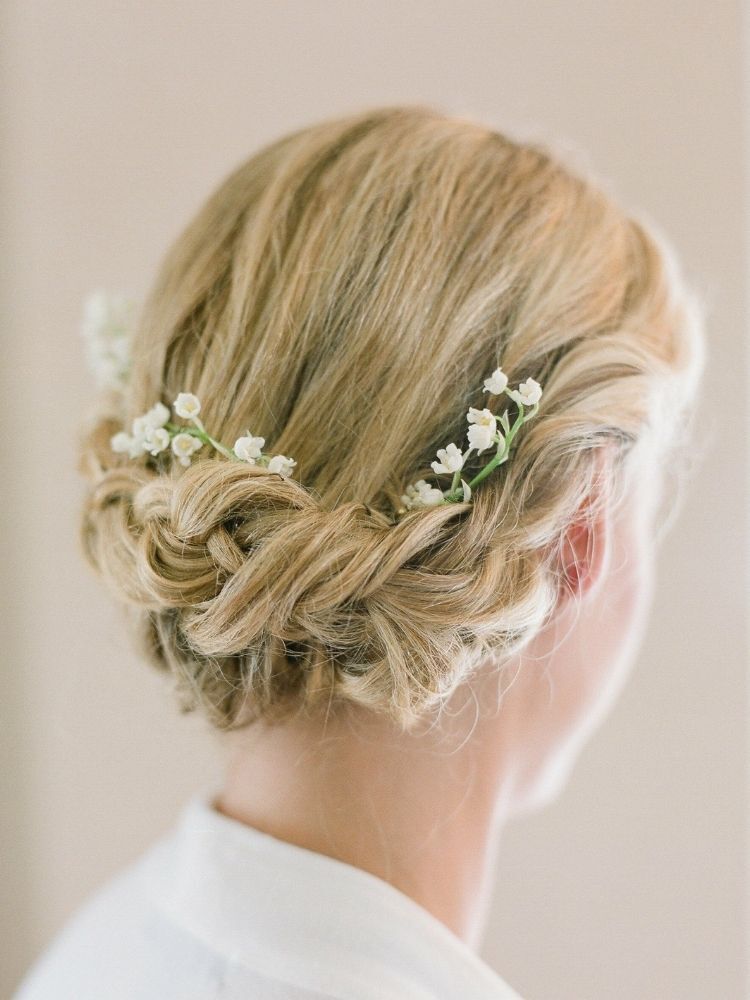 wedding updo with fresh lily of the valley flowers