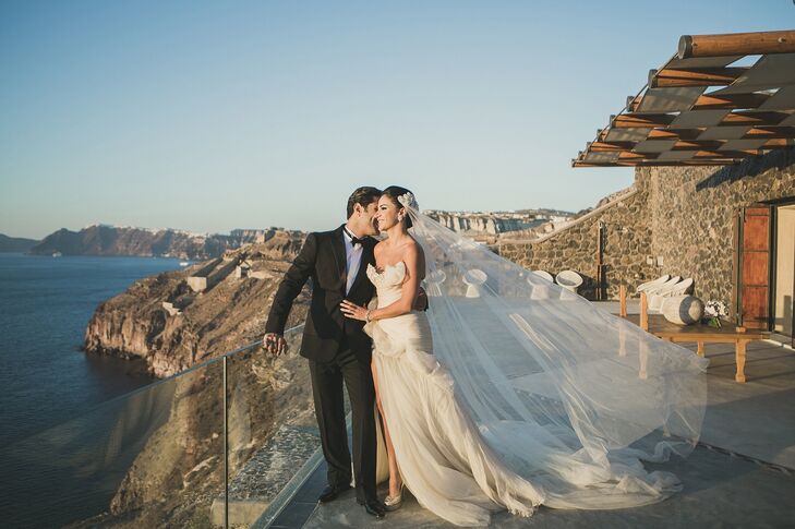 From Dubai, United Arab Emirates, Mariam and Bassel wanted a stylish, chic destination wedding complete with fireworks (literally) in Santorini, Greec