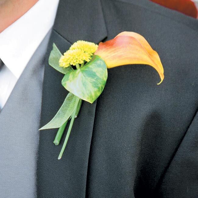 Scott complemented his gray vest and tie with a simple orange calla lily pinned to his lapel.