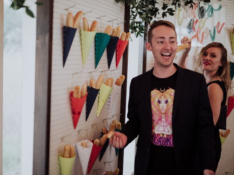 wedding food station breadstick wall